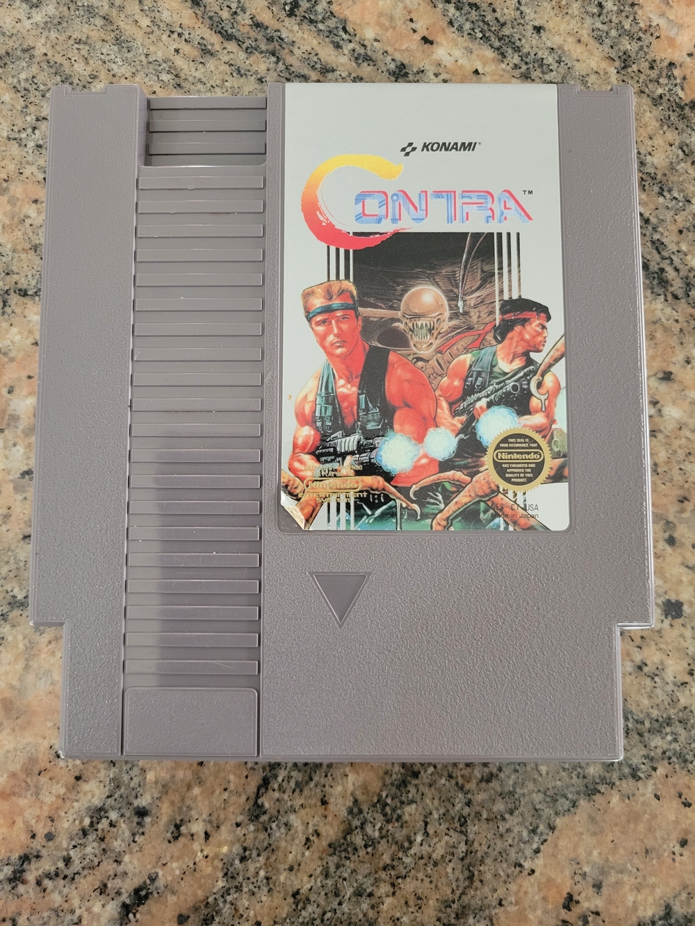 Nintendo (NES) Contra Game w/ Manual and Protective Sheath. Excellent condition.